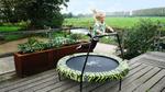 Trampolina dla dzieci Exit Tiggy 140 cm z poręczą czarno-zielona w sklepie internetowym DostawaNaJutro.pl