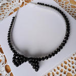 Opaska z czarnych perełek z kokardką w sklepie internetowym Artillo